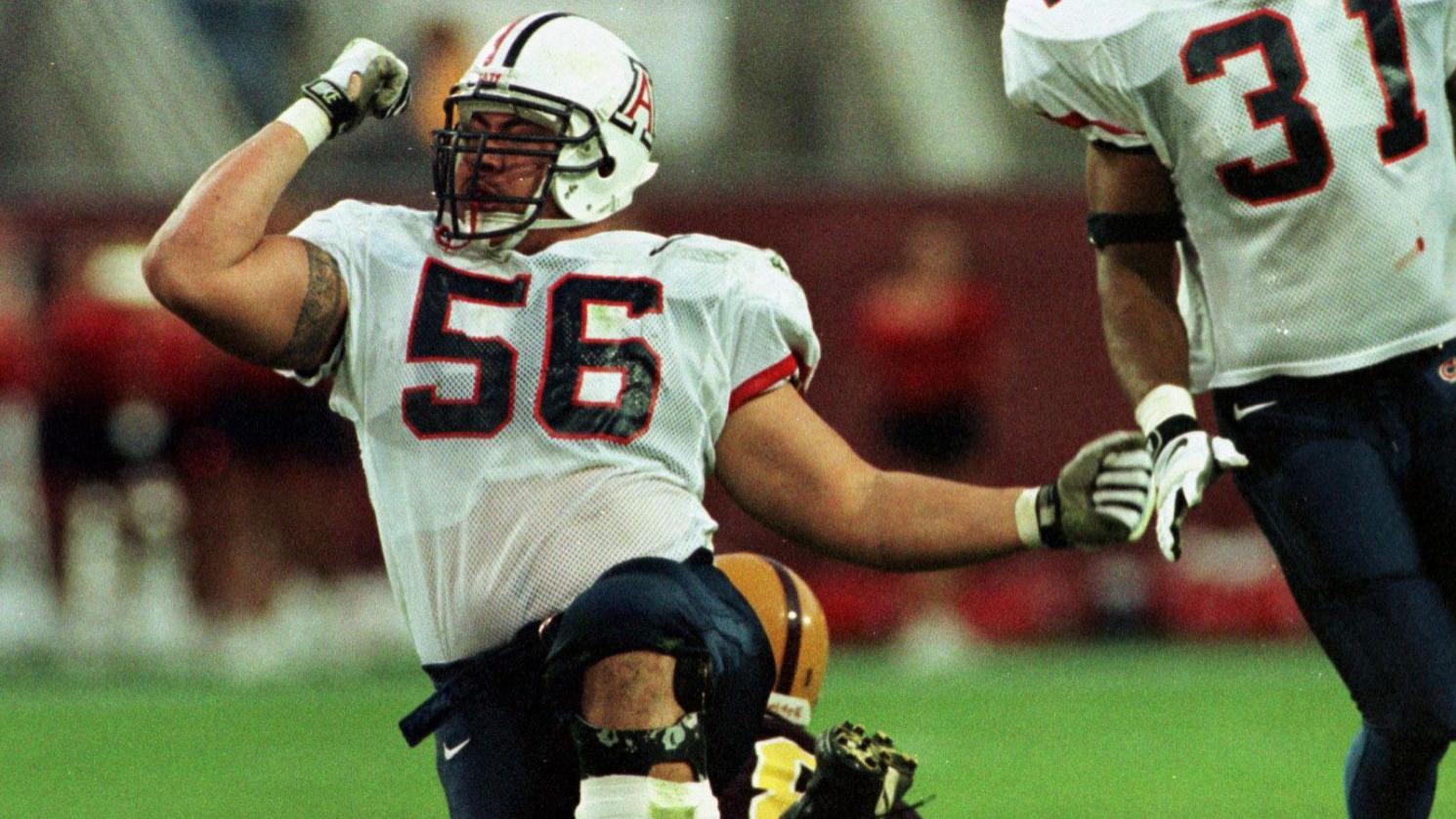 Joe Salave'a reflects on his Wildcats career, relationship with Dick Tomey — and what it's like coaching the Ducks